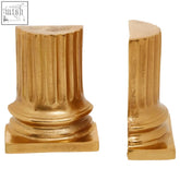 Gold pillar bookends with a classic fluted column design and square bases in a kensington townhouse set of 2