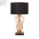 Copper-toned kensington townhouse table lamp with black fabric drum shade and sleek black marble base