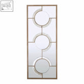 Kensington townhouse wall mirror with three vertical circular mirrors in light gold-toned metal frame, tall rectangular design