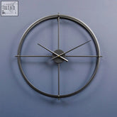 Kent large black wall clock with minimalist design featuring a sleek circular metal frame and thin hands