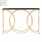 Kia black and gold console table with a gold console frame and sleek black marble top featuring geometric circles