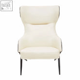 Cream-colored kiev ivory armchair with sleek black metal legs and high backrest in faux leather upholstery