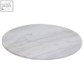 Kindia round white marble lazy susan with a white marble serving platter featuring subtle gray veining