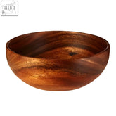 A smooth kora acacia fruit and salad bowl brings a warm brown finish with natural wood grain patterns perfect for salads