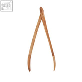 Light brown olive wood serving tongs with smooth tapered arms and rounded tips for elegant olive wood serving