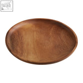 Kora round acacia wood plate with natural grain in warm brown finish smooth oval wooden serving plate