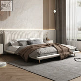 Modern white upholstered kuri bed with ribbed vertical channelling headboard and chic comfort gold-tone legs