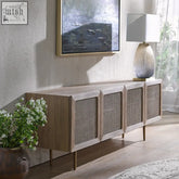 Light wood kyoto cabinet sideboard with woven cane panels and slender metal legs perfect for stylish storage