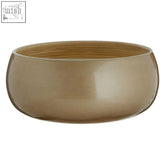 A sleek matte gold ceramic small gold bowl with smooth rounded exterior and natural wood interior called kyoto round