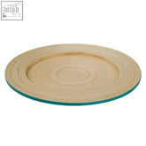 Circular bamboo charger plate with concentric rings and a teal rim perfect for stylish table settings