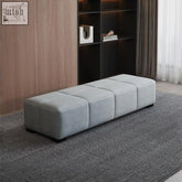Light gray velvet la23 bench storage with segmented square cushions and dark wooden legs for stylish seating