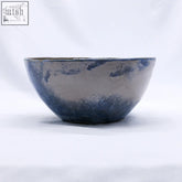 Large stone reef blue handmade ceramic stoneware dinner bowl with mottled blue gray glaze and organic uneven rim
