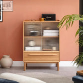 Laura sideboard with glass door and drawer in light oak finish featuring modern wooden design with vertical glass panels