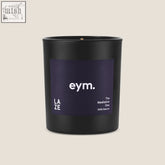 Black cylindrical matte candle jar with dark purple eym label the meditative one standard candle for relaxation