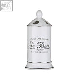 Le bain white ceramic toothbrush holder in cream stoneware with black cursive lettering and silver rimmed lid