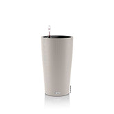 Silver ribbed lechuza cilindro color 23 plant pot with black interior and transparent watering spout showing water level