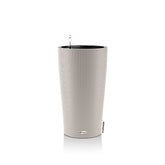 Silver ribbed lechuza cilindro plant pot with black interior and metal spout for water reservoir and water level monitoring