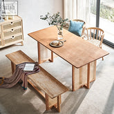Light wood leocadia solid wood dining table with woven cane legs and sides perfect for solid wood dining rooms
