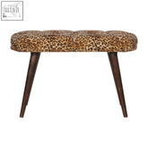 Leopard print deep button tufted bench with dark wood legs perfect for stylish seating