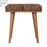 Leopard velvet tray style footstool with leopard print upholstered wooden tapered legs for stylish seating