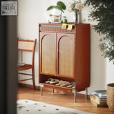 Warm-toned wooden levy shoe storage with arched rattan doors and lower shelf holding slippers for easy shoe storage