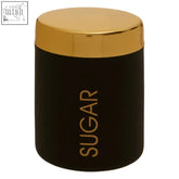 Black cylindrical liberty sugar canister with gold lid and vertical sugar lettering matching the lid color