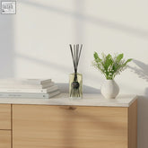 Clear glass lily of the valley diffuser 220ml with black reeds and minimalist label using natural fragrance oils for timeless beauty