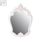 An antique white locatelli rose crest wall mirror with intricate baroque style carvings and ornate frame design