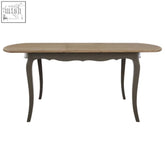 Loire dark grey dining table with oval light wood top and curved legs perfect for grey dining spaces