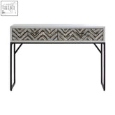 Gray and black chevron drawer console table with sleek metallic sled legs and a modern metal frame