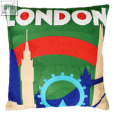 Green london needlepoint cushion with embroidered skyline featuring white lettering red archway blue wheel and spires