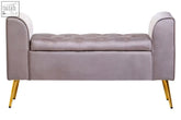 A sleek lavender mink velvet ottoman storage bench with tufted upholstery and slender gold-tone legs