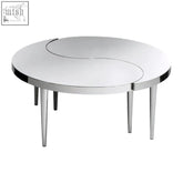 A sleek lure yin yang stainless steel coffee table with polished chrome finish and slender legs for modern spaces