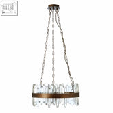 A modern lustra acrylic chandelier with clear crystal rods and a copper band featuring an industrial design
