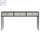 Black-framed luxor three drawer rectangular console table with textured light gray mirrored finish and round black knobs