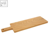 Light-colored small oak wood paddle serving board with smooth natural grain and small handle for chopping and serving