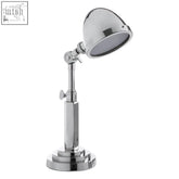 Chrome finished macon table lamp with adjustable arm and tiered circular base in classic industrial design