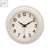 White round maddox cream metal wall clock with black numerals on cream face perfect for face making decor