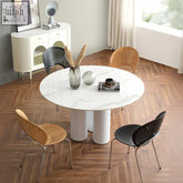 Madge margaret round dining table with white marble top and fluted pedestal legs made from sintered stone