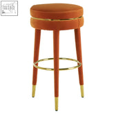 Manhattan orange velvet bar stool with orchid velvet seat and gold-tone metal legs and footrest bar stool