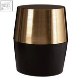 Margot black and copper side table with a sleek two toned design featuring brushed gold upper and matte black lower half