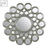 Maris silver wall mirror with silver-toned concentric rings and metallic frame perfect for modern decor