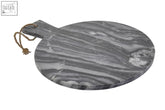 Marmore grey marble round paddle serving board with grey marble stripes and natural wood handle tied by twine