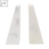 Two white marble bookends with gray veining from the marris set perfect for stylish bookshelf decor
