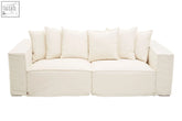 Cream sofa minimalist two-seater with linen blend fabric and european style clean lines and matching throw pillows