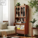 Mason tall sideboard in warm cherry wood with arched glass doors and lower open shelf displaying cards and notes