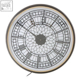 Mateo big ben inspired wall clock with a dark gray metal frame, white face, roman numerals, and geometric center pattern