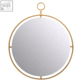 Matera gold wall mirror featuring a gold-toned circular frame with minimalist design and hanging ring detail