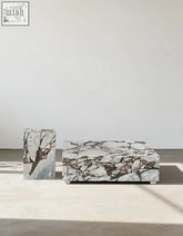 Matteo square coffee table in white and gray marble with a sleek rectangular design for modern living spaces