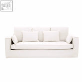 Menton 3 seat cream sofa with white upholstered fabric clean modern lines and matching cushions perfect cream sofa